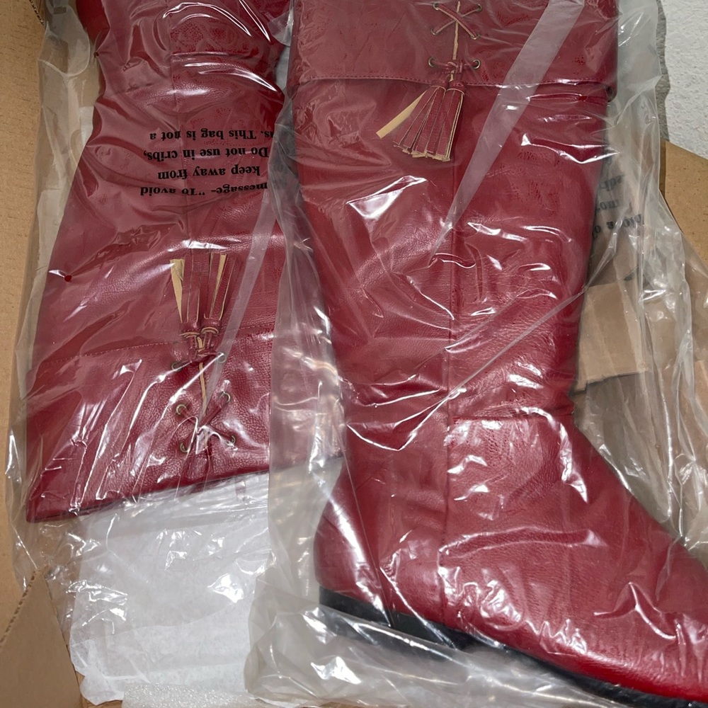 Brand new red boots